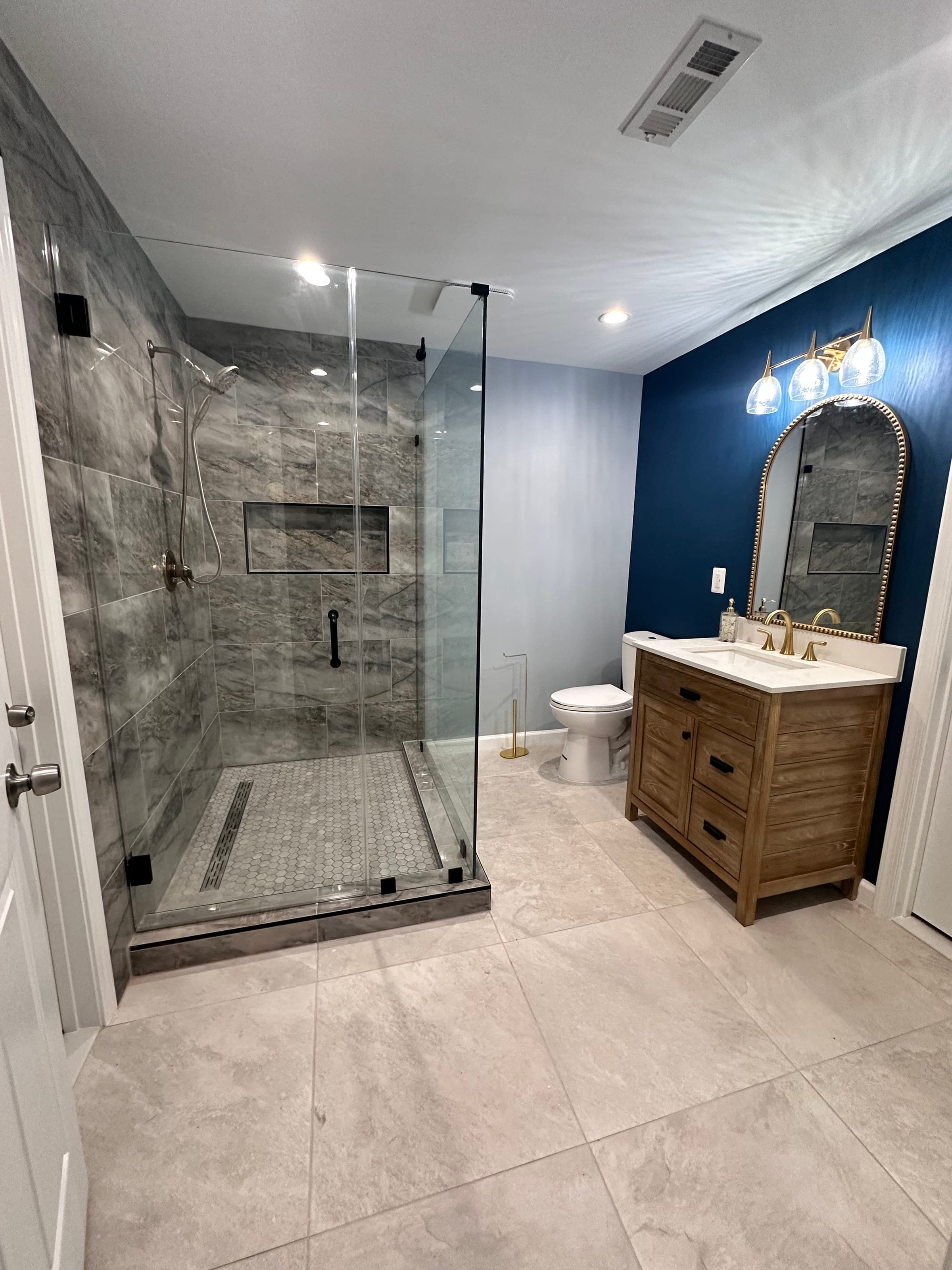 Basement Guest Bath, Navy & Brass, Northern Virginia — finished work, photo 1